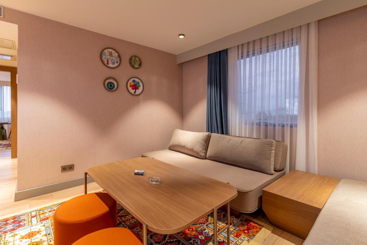 Mercure Trabzon Hotel Bagian luar foto A room at the hotel